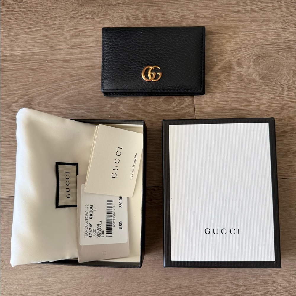 Gucci Black Leather bi- fold Card holder